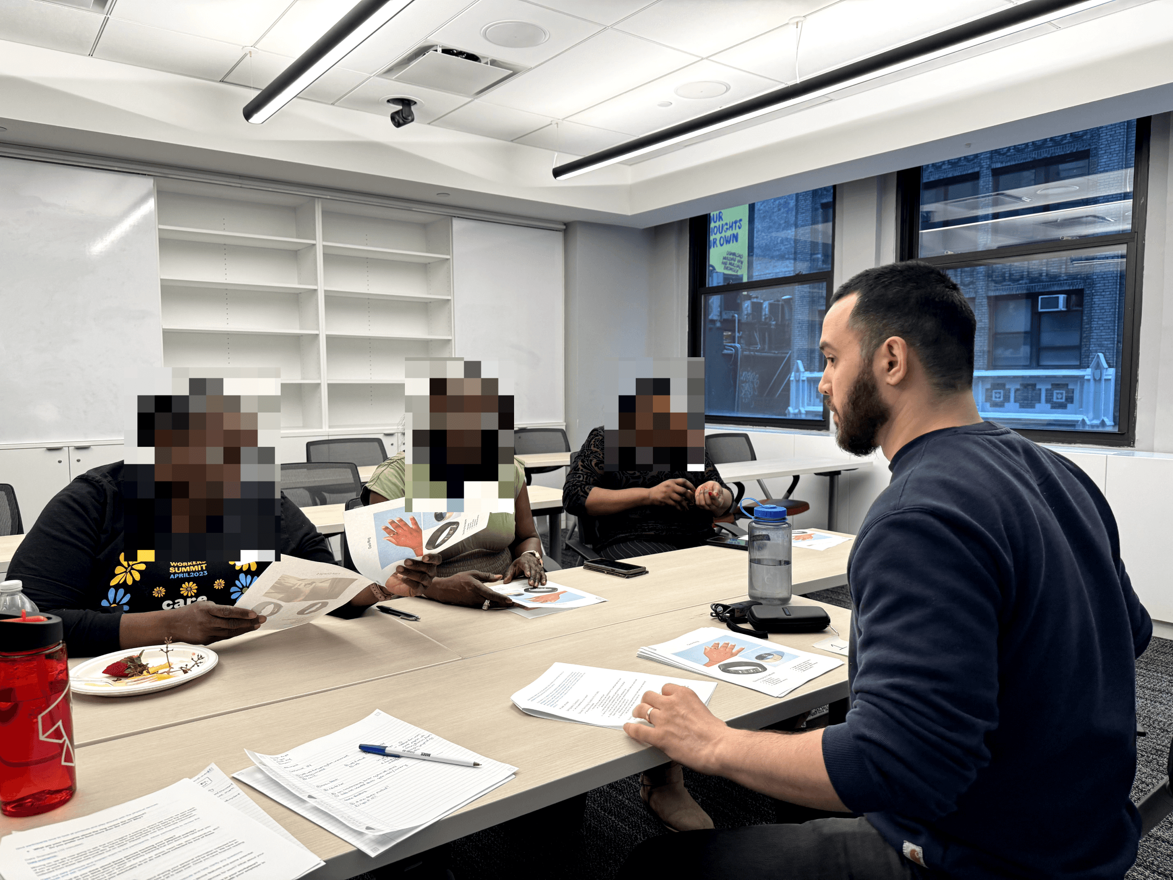 Focus group with home care workers reviewing interview artifacts.